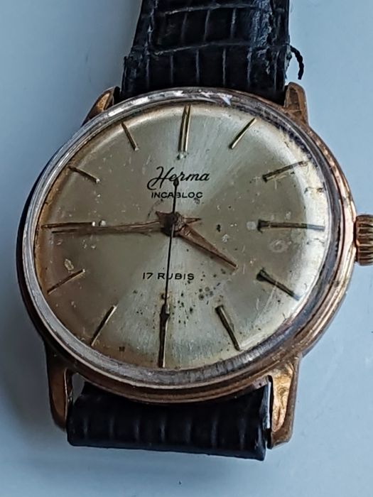 Ceas Herma Placat cu aur Int. Manuala Funcționează excelent!