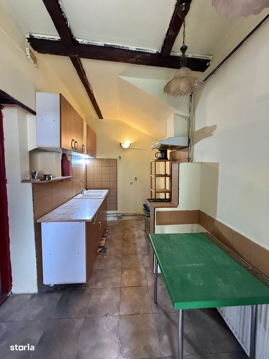 Apartament la curte comuna, 2 camere, 48 mp utili si teren comun 550 m