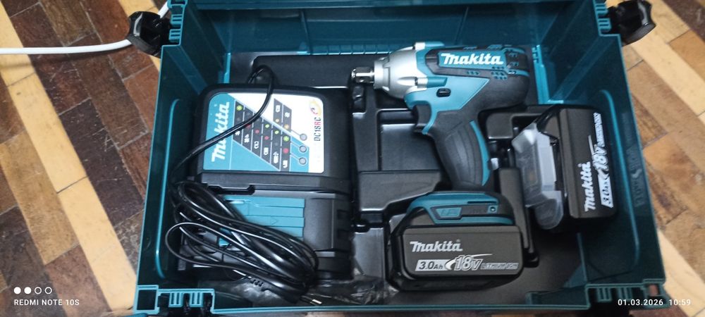 Ударный гайковёрт Makita,с набором ударных головок.