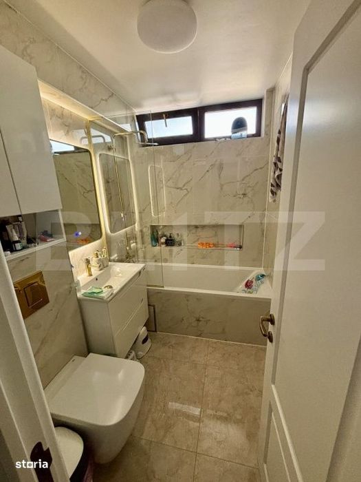 Apartament cu 3 camere, etaj 2, renovat complet - zona Centrala