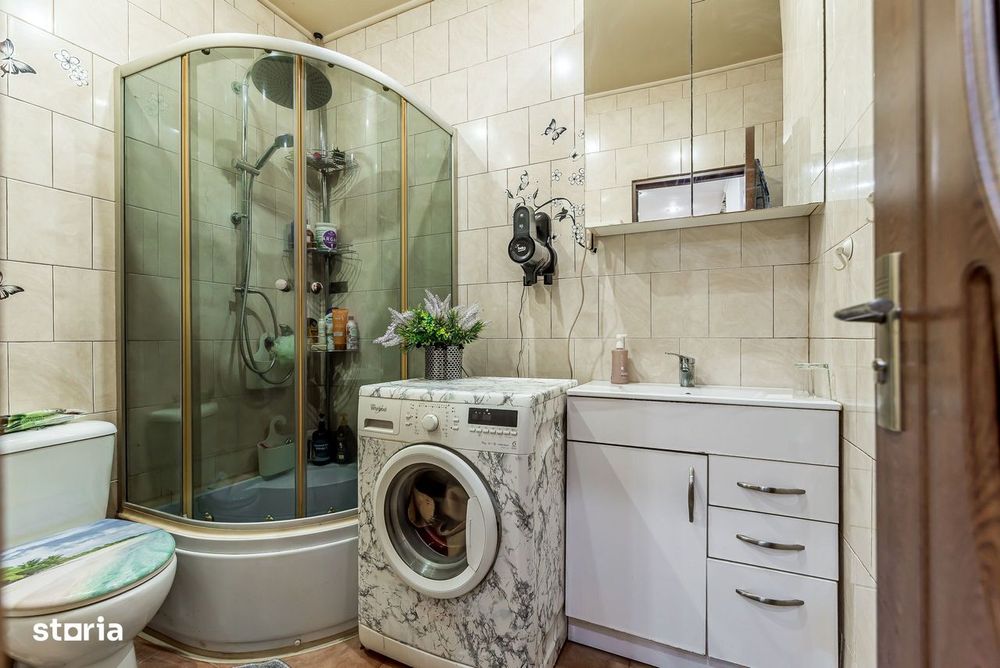 Apartament în centru cu acces auto și garaj propriu