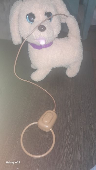 Продам игрушечный собачку