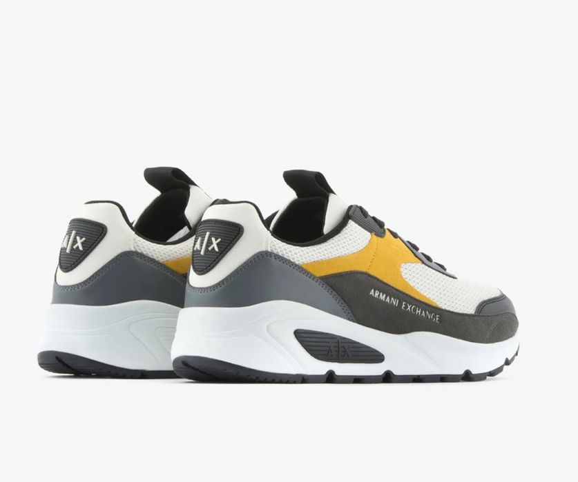 Продам новые кроссовки АХ