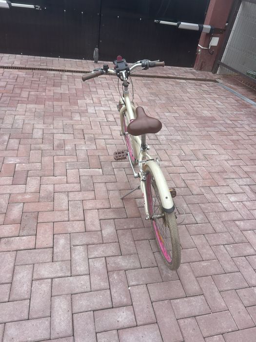 Bicicletă B’Twin (alb cu roz)