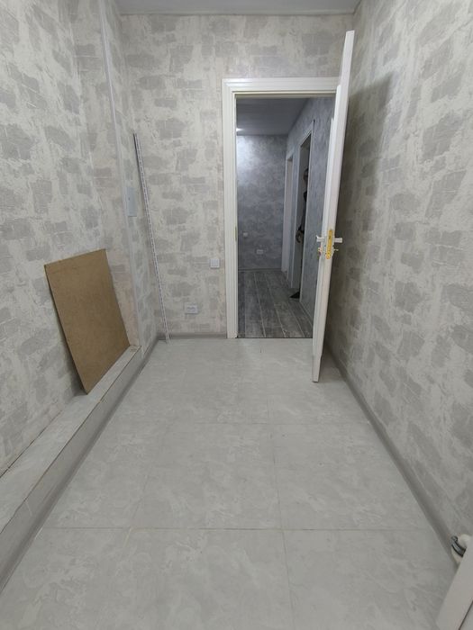 2 х комнатную квартиру Янгиюль. Новый евро ремонт. Первый этаж