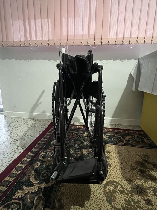 Коляка инвалидная