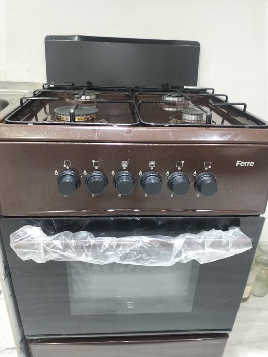 Kir mashinasi va gaz plitasi