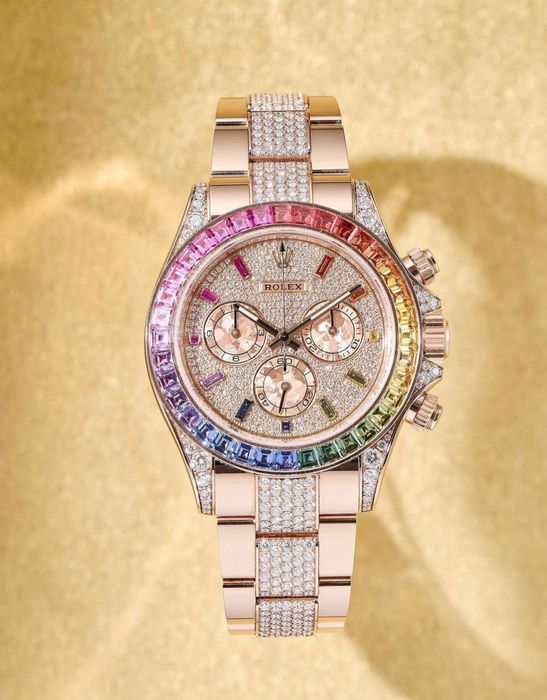 Rolex rainbow . Gold 20K, sapphires/diamonds. Luxury quality.