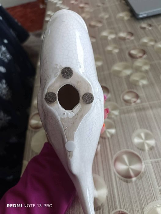 Стара статуетка на риба