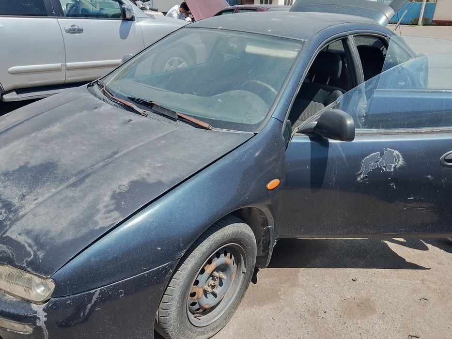 Продам Мазду 323
