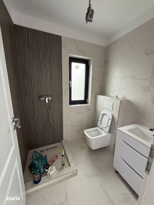 Casa pe parter cu 4 camere , incalzire in pardoseala , teren 400 mp