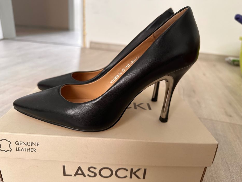 Обувки на висок ток