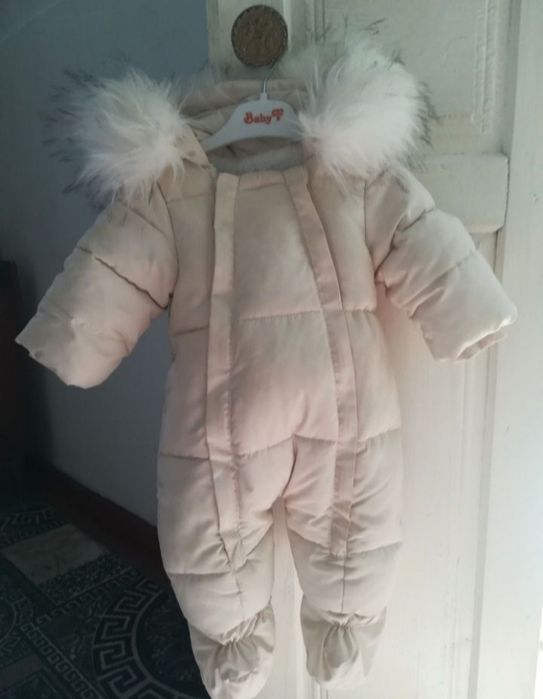 продам комбинезон 6-9 месяцев, шапка зимняя