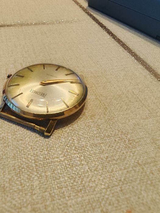 Продавам златен ръчен часовник 14к