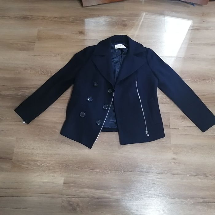 Стильное фирменное пальто