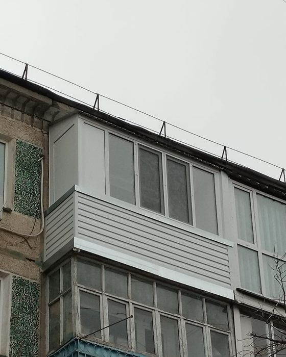 Балконы с обшивкой