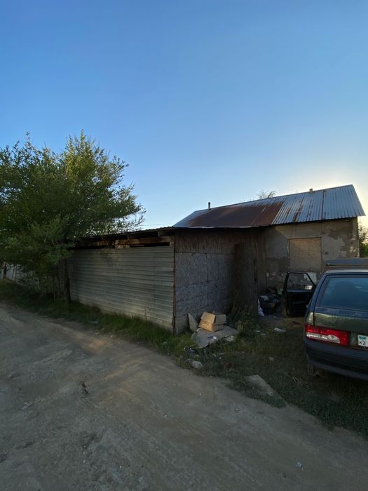 Земелный дом на строй материалы