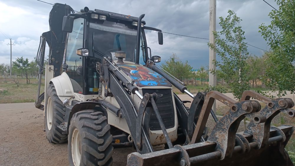Услуга экскаватора погрузчика