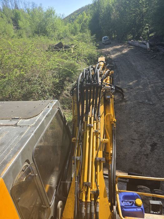 Excavator 15 tone JCB JS130W pe roti webasto