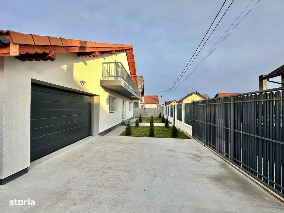 Casă individuală de vanzare  cu garaj și curte proprie – Hălchiu