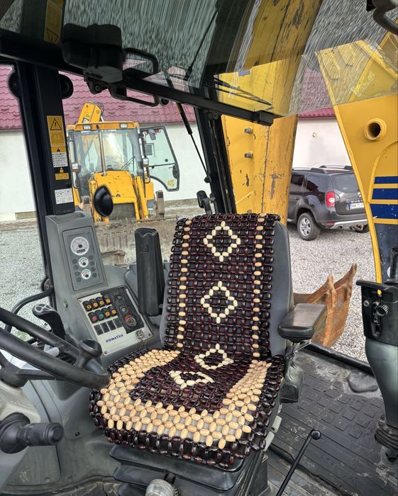 Buldoexcavator KOMATSU wb97R