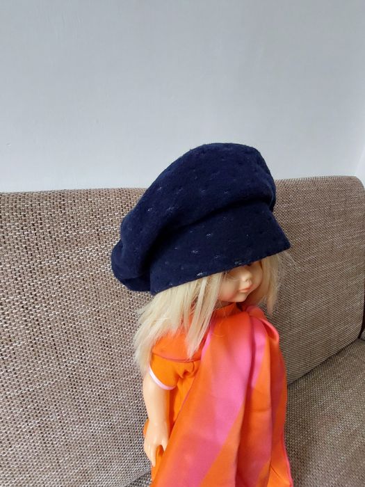 Bereta calduroasa de lana cu captuseala plusata