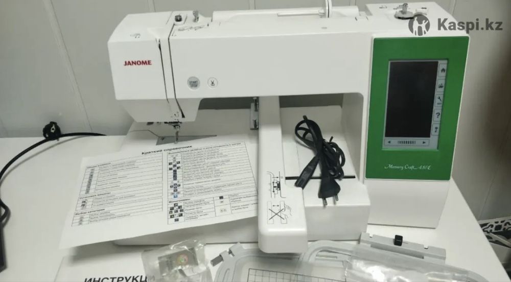 Вышивальная машина Janome Memory Craft 450E.