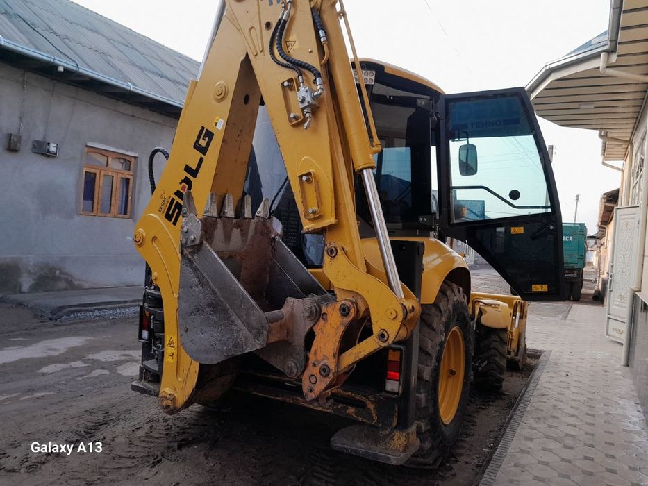 Экскаватор погрузчик Volvo SDLG