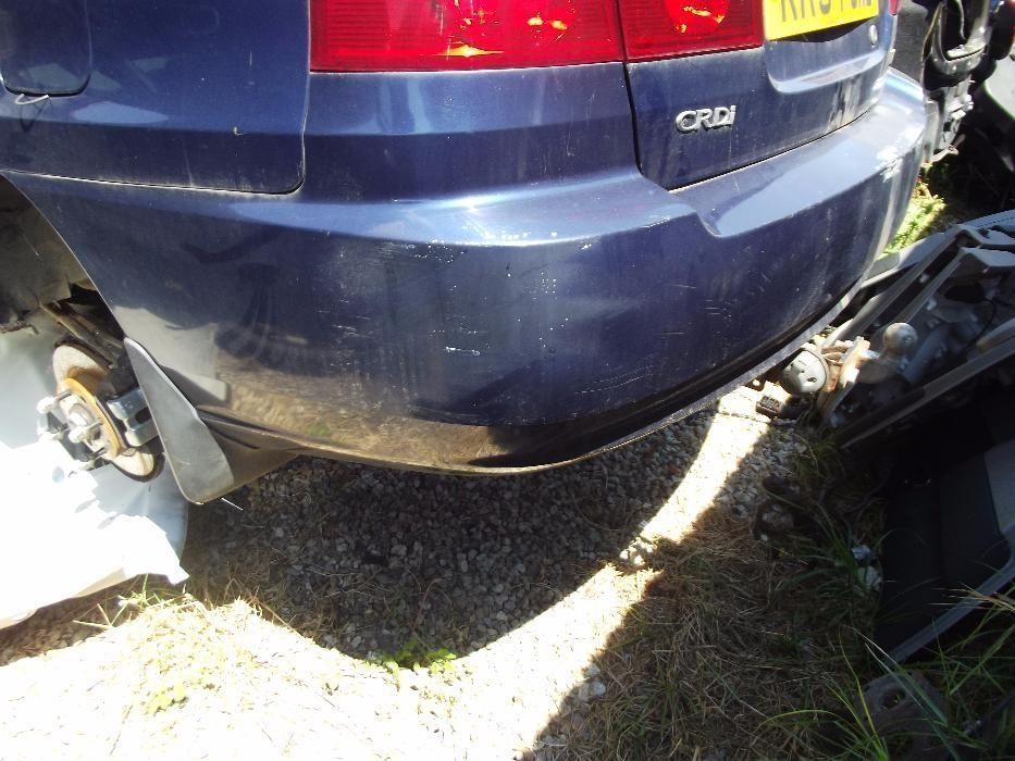 Bara spate Kia Carens spoiler spate kia Carens dezmembrez Carens 2.0