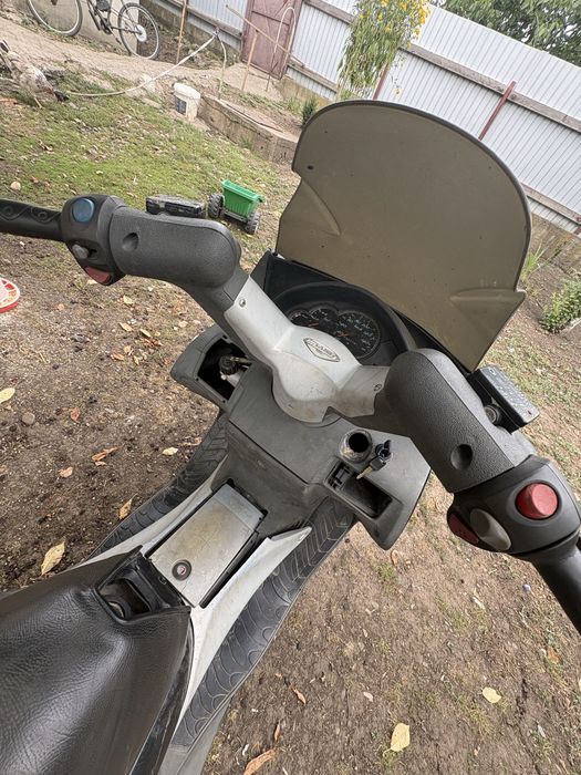 Malaguti madiosn 125cc 4 timpi
