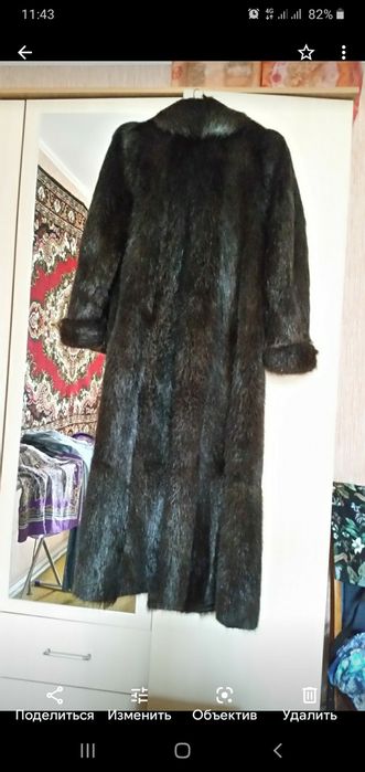 Шуба тёплая, красивая.