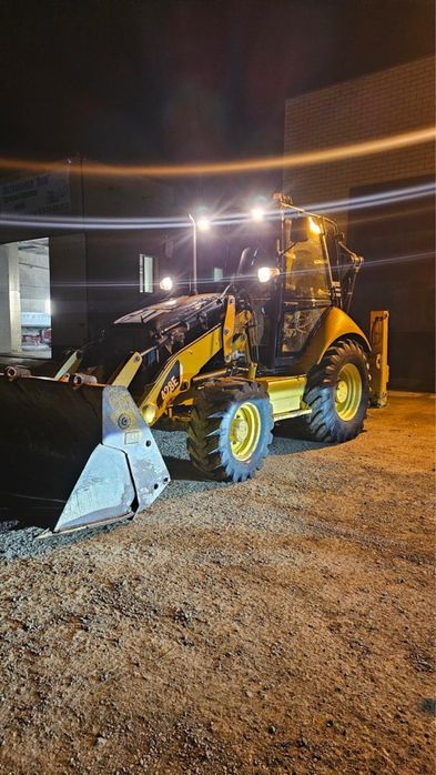 Экскаватор- погрузчик 3в 1