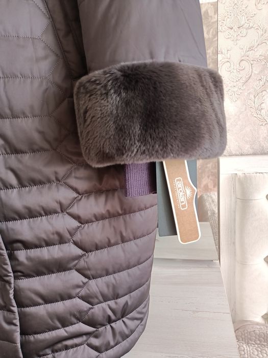 Продам зимний новый пуховик