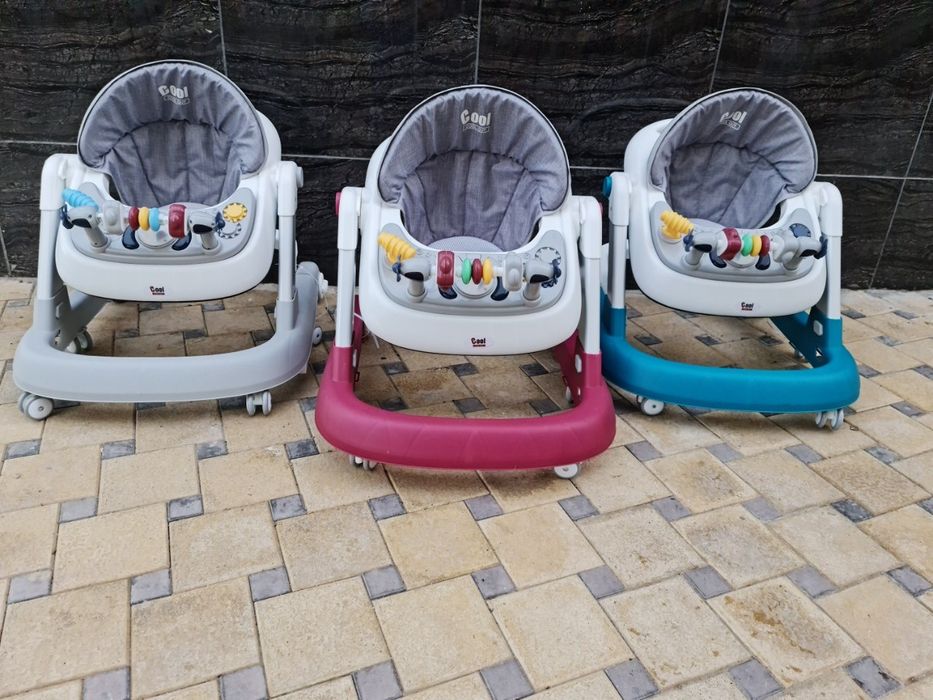 детский ходунок толтунок с колесами и музыкой