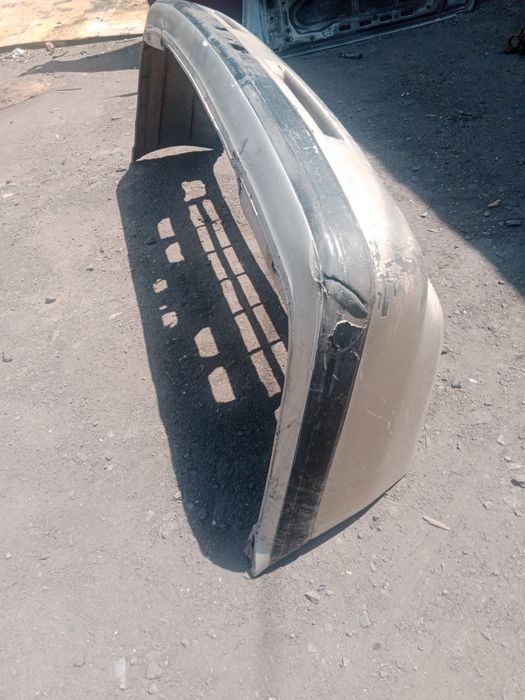 Бампер передний Мазда 626 90год