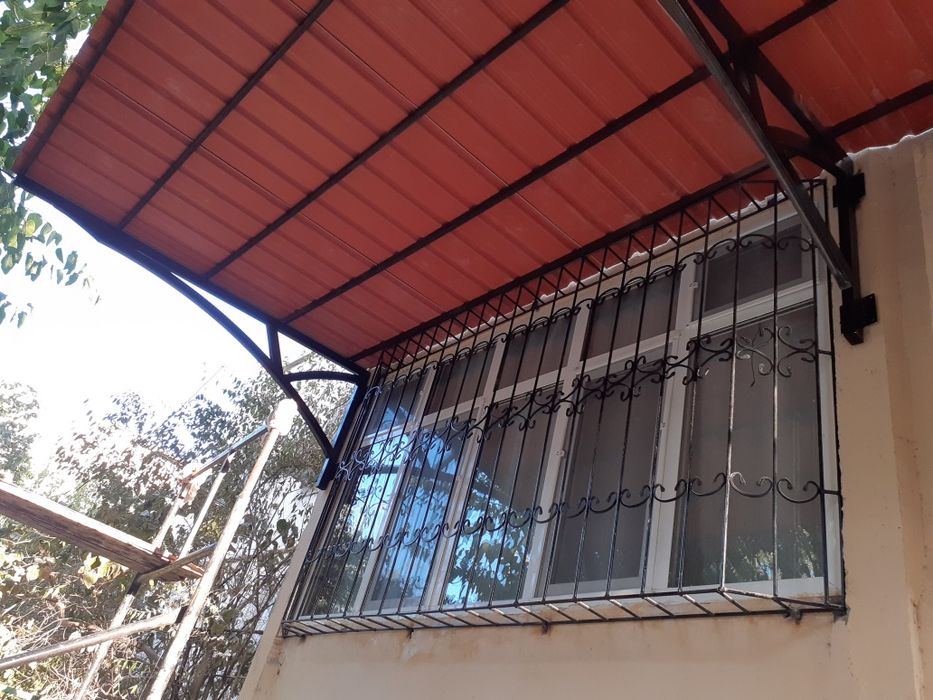 Козырьки. Навесы. Бельевые ролики.