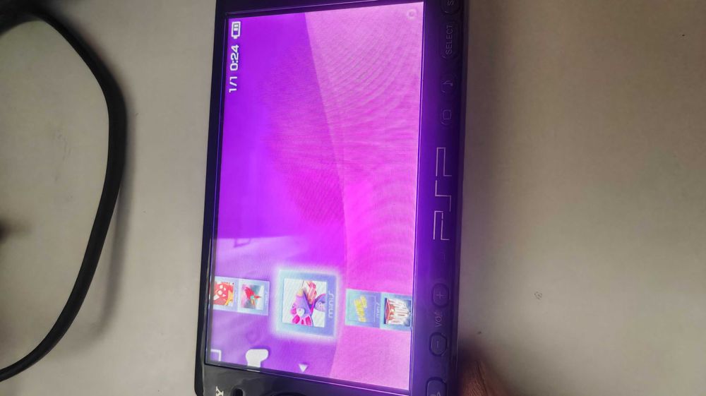 Playstation PSP modat, cu 116 jocuri -vandut