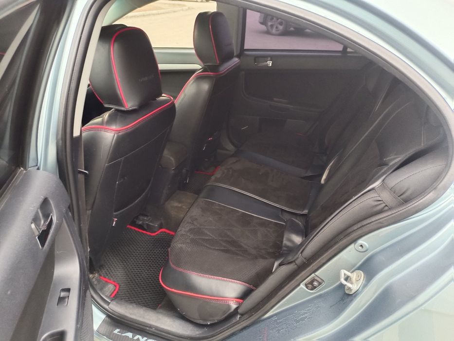 Митсубиси Лансер Х