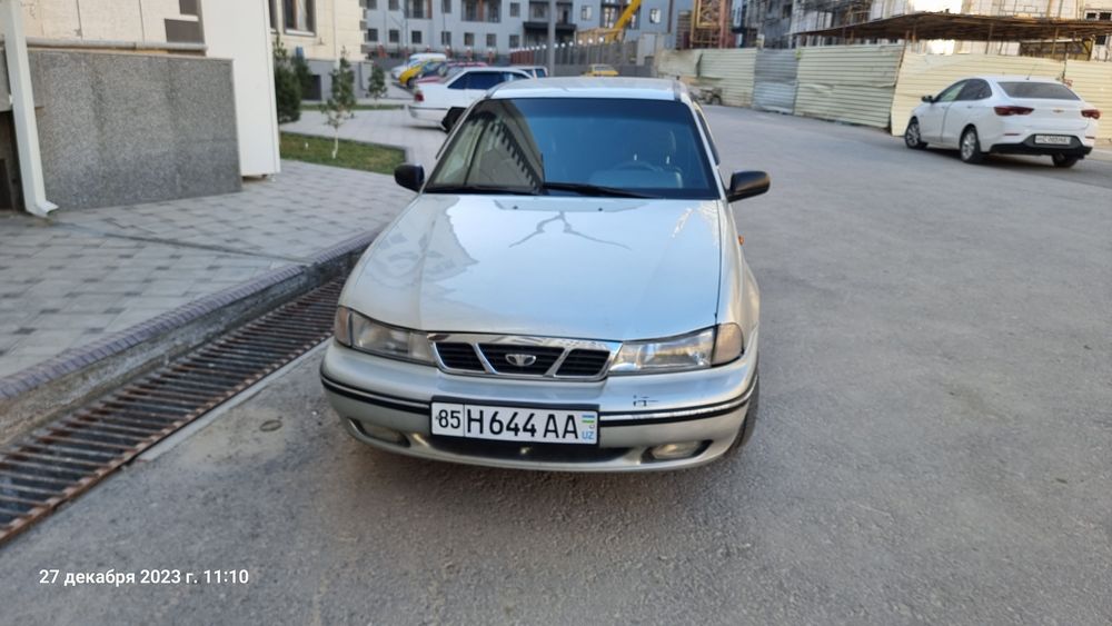 Nexia 1 2006йил серый цвет
