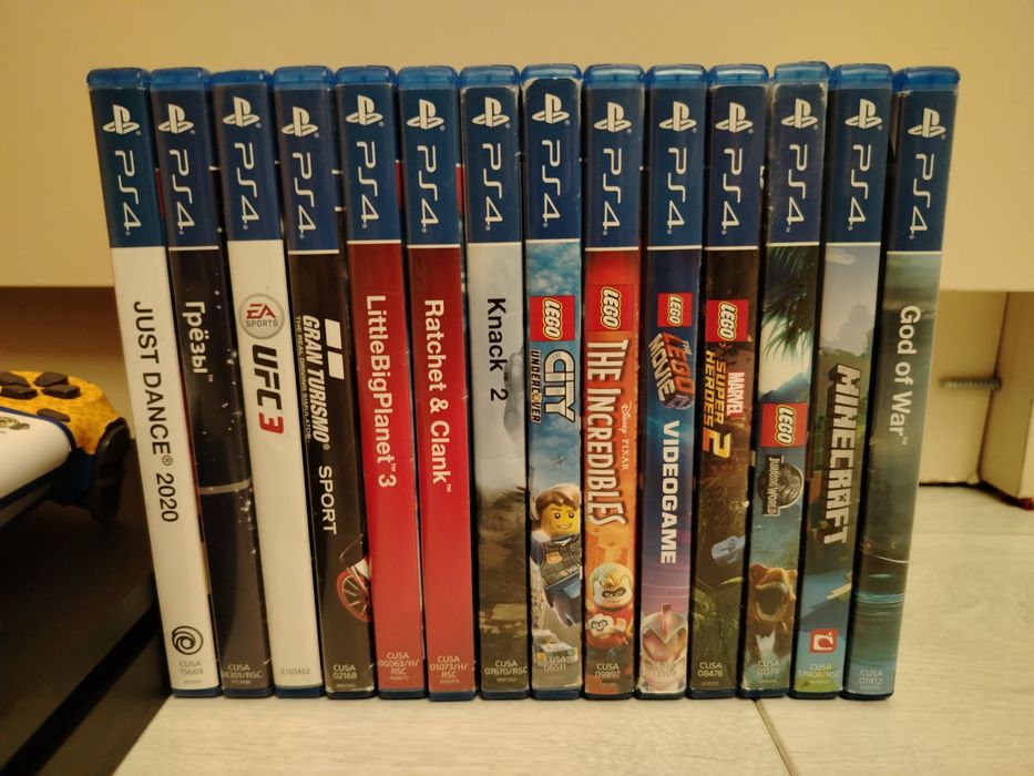 PlayStation 4 Slim 1TB + 2 геймпада + 14 игр