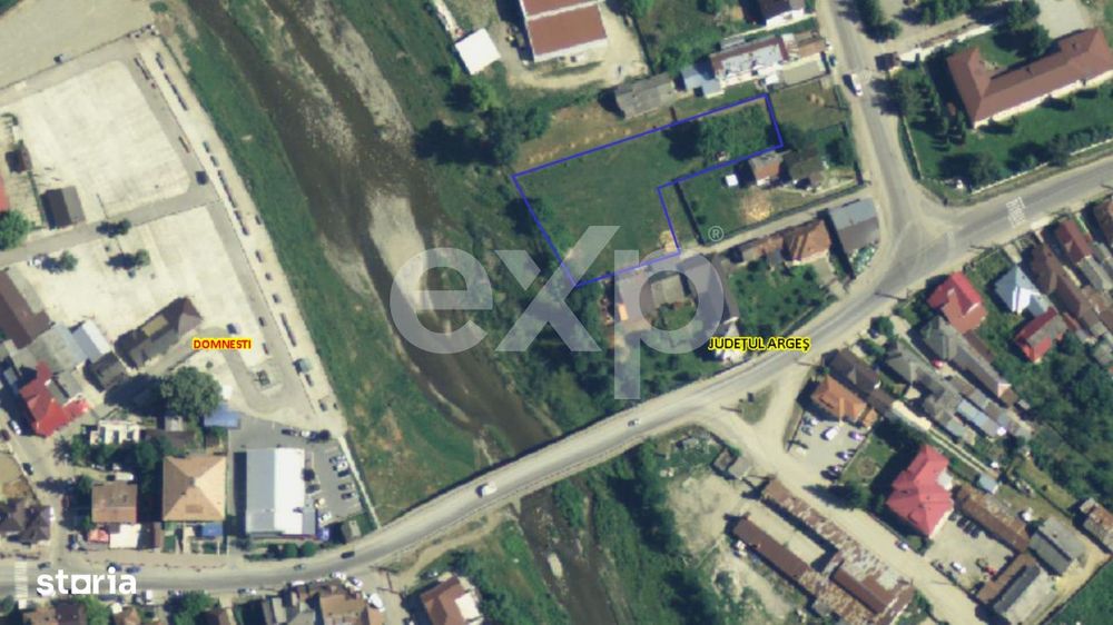 Teren intravilan Domnesti, Central langa Liceu, pe malul Raului