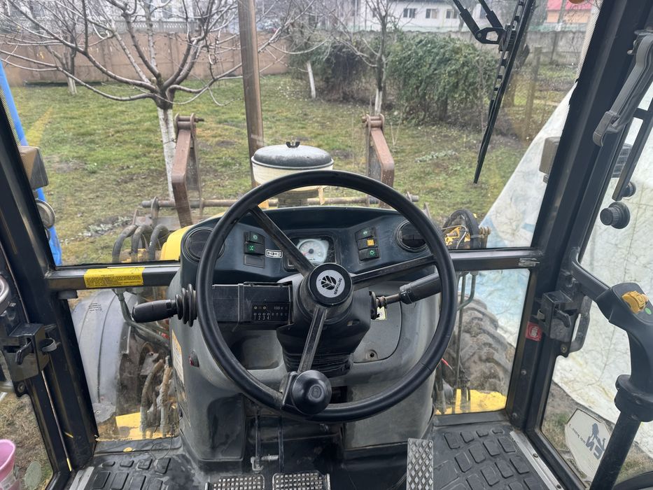 Buldoexcavator New Holland LB110