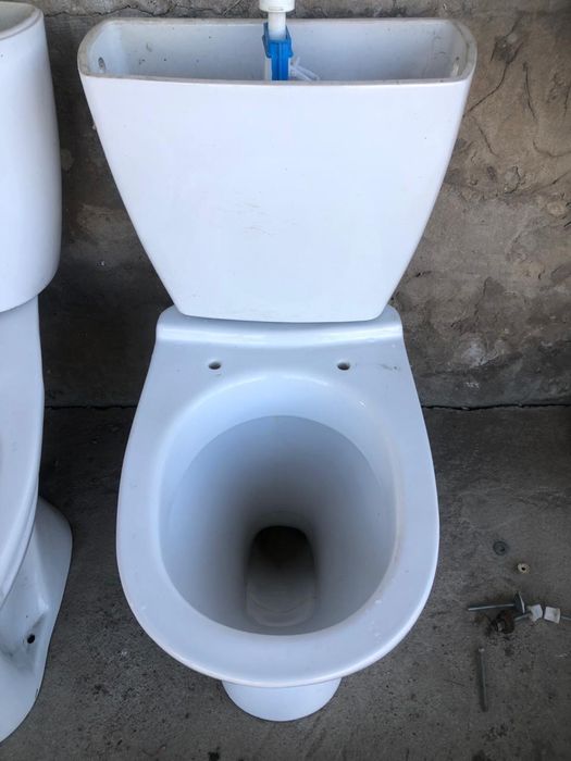 Унитазы с бочком. Для стройки. Разные