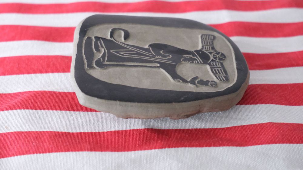 Ancient Image Engraved on Slate Tablet