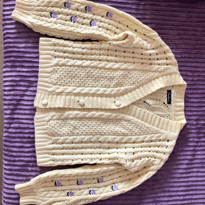 Пуловеры вязаные.