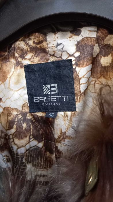 Продам зимний пуховик