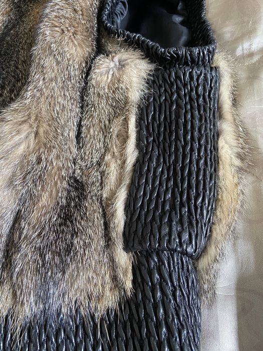 Меховая жилетка