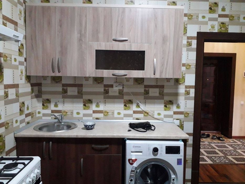 Янги домдан 2 хонли 2 каватдан квартира сотилади Кредит булади 6 микрн