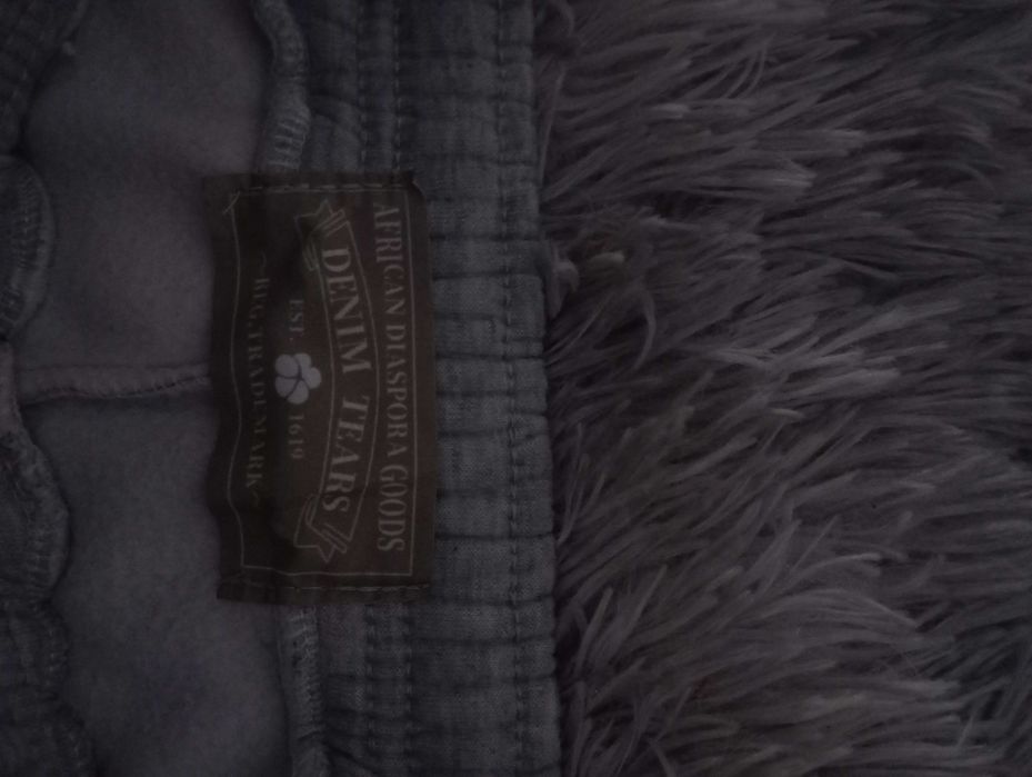 pantaloni denim tears