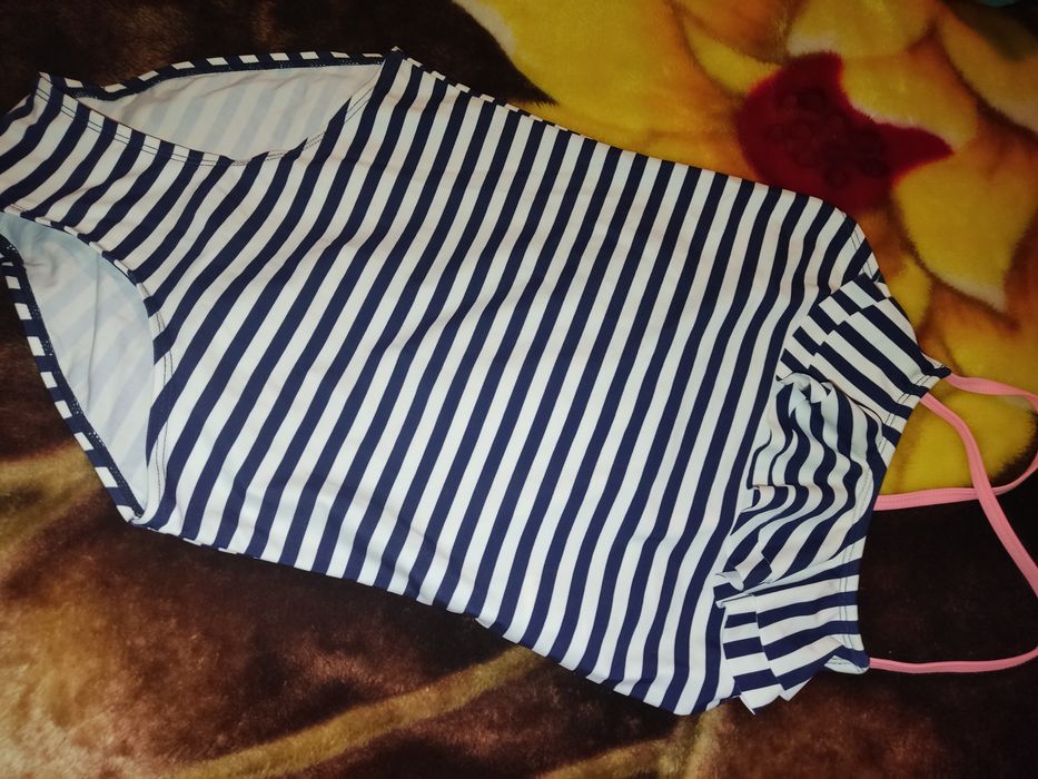 Продам два классных купальника на девочку